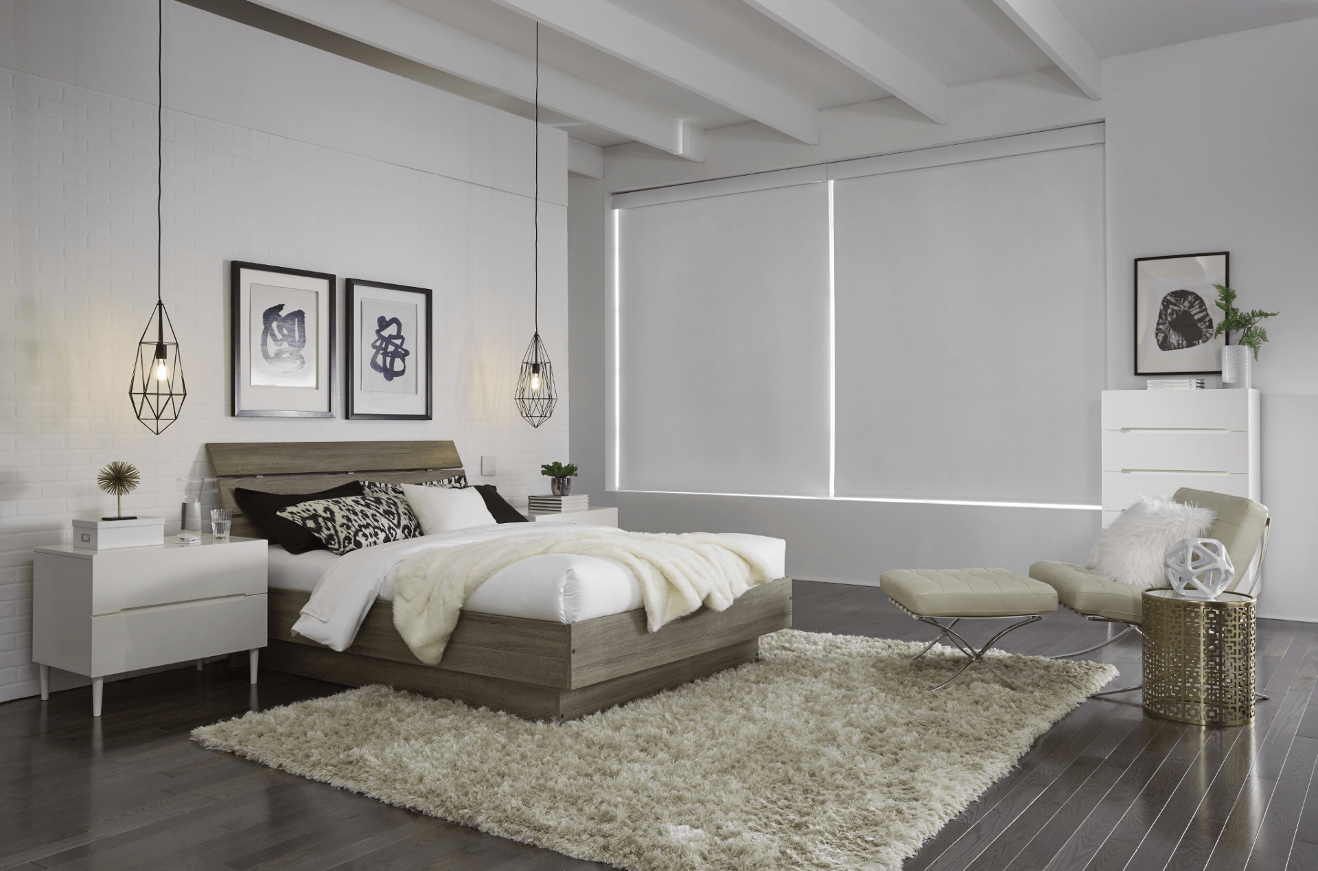 Modern bedroom with cozy decor, featuring a bed with fluffy blankets, minimalist furniture, abstract artwork, and soft lighting. Neutral tones create a serene atmosphere.