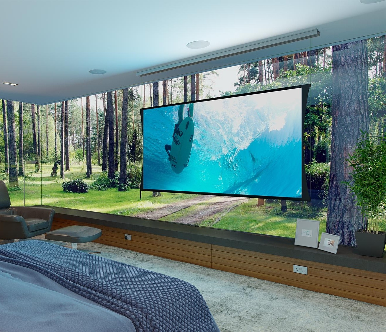 A modern bedroom features a large screen displaying surfing, surrounded by glass walls overlooking a lush forest landscape, creating a serene atmosphere.